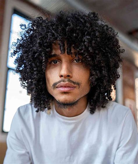 black males with long curly hair|frizzy hair black male.